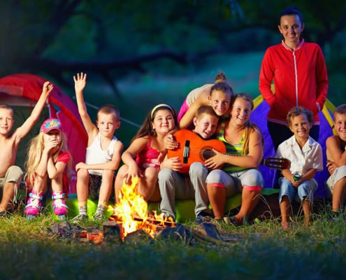 kids around campfire at summer camp